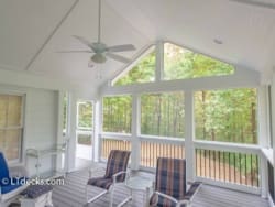 Screen porch with vaulted ceiling.